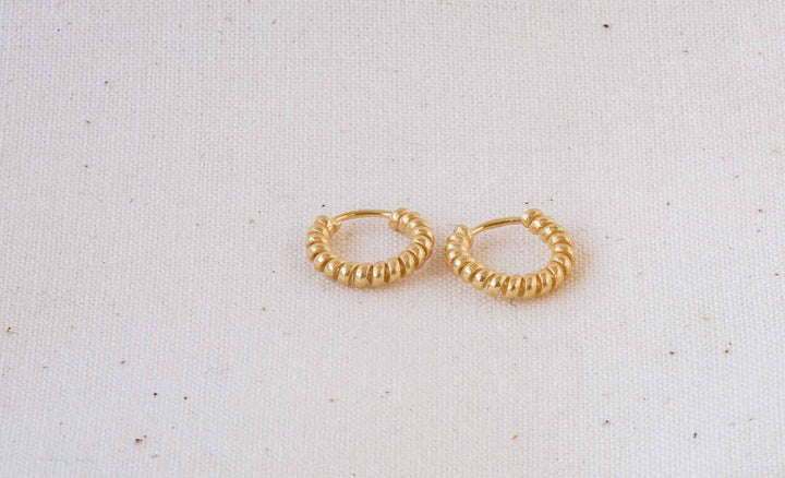 What are huggie hoop earrings & how do I wear them?