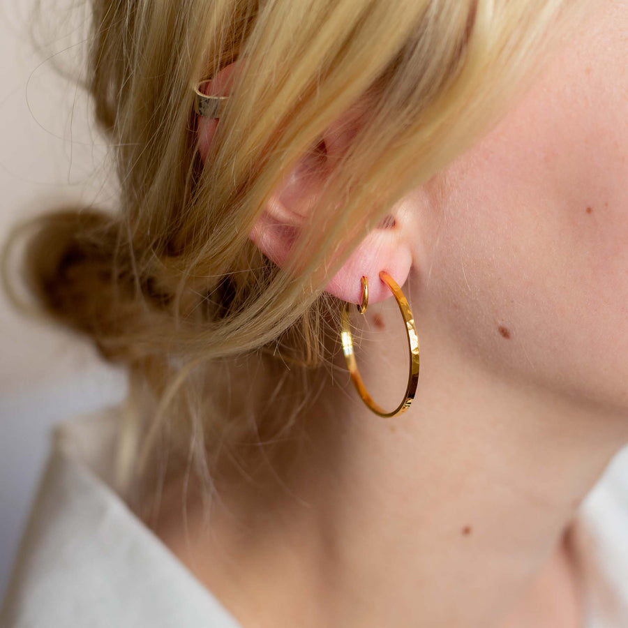 Devi Curly Hoops in hammered Gold